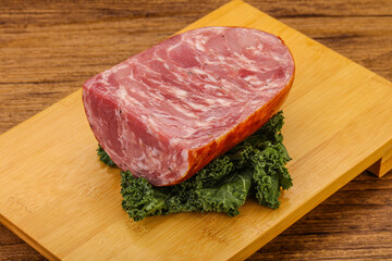Beef ham piece over board