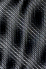Woven pattern of stainless steel threads from kitchen utensils