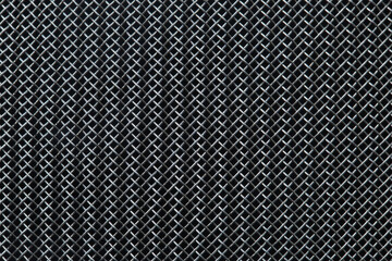 Woven pattern of stainless steel threads from kitchen utensils