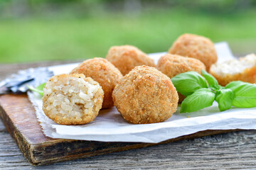 Italian arancini. Home made rice balls with mozzarella cheese,parsley ,lemon and parmesan cheese.