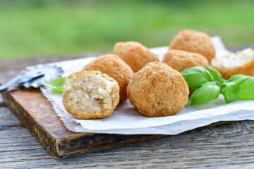 Italian arancini. Home made rice balls with mozzarella cheese,parsley ,lemon and parmesan cheese.