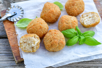 Italian arancini. Home made rice balls with mozzarella cheese,parsley ,lemon and parmesan cheese.