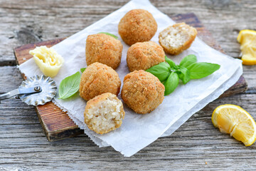Italian arancini. Home made rice balls with mozzarella cheese,parsley ,lemon and parmesan cheese.