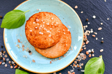 Homemade ketogenic  Salmon Burger with Tartar Sauce and  whole grain ketgenic bread. Healty food