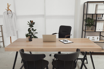 Modern medical office interior with doctor's workplace