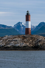 Bird Island in the Beagle Channel near the Ushuaia city. Ushuaia is the capital of Tierra del Fuego province in Argentina. Place full of birds and pinguin next to a lighthouse.