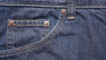 Texture of blue jeans with front bag, Detail cloth of old denim for pattern and background, Close up