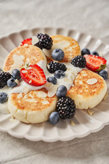 homemade breakfast of cottage cheese with fresh berries