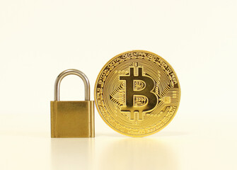 bitcoin security concept. Gold coin with padlock