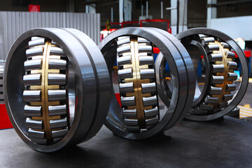 Large diameter bearings in production. Bearing manufacture. Heavy industry. Copy space. Photos in...