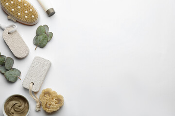 Flat lay composition with pumice stones on light background. Space for text