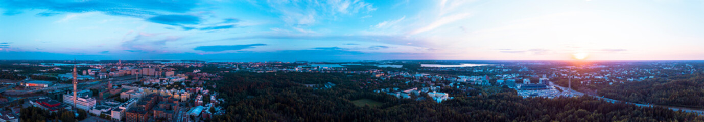 Panoramic view of the city of Helsinki from above at sunset