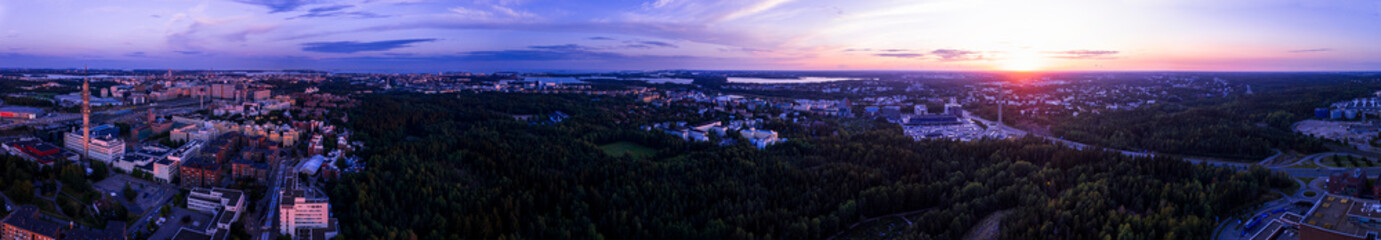 Panoramic view of the city of Helsinki from above at sunset