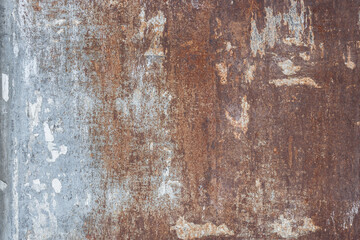 Rusted metal plate with peeling paint