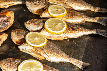 Grilled carp fish ,Dorada (Sparus aurata) with lemon in Bistrita ,Romania
