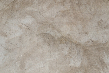 Cracked cement plastered wall as abstract background.