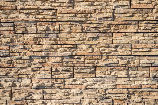 Artificial stone wall as a background.