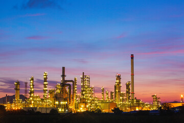 Fototapeta na wymiar Oil​ refinery​ and​ plant and tower column of Petrochemistry industry in pipeline oil​ and​ gas​ ​industrial with​ cloud​ red sky the morning