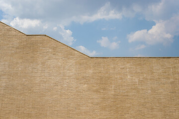 Fortress walls against the sky with clouds