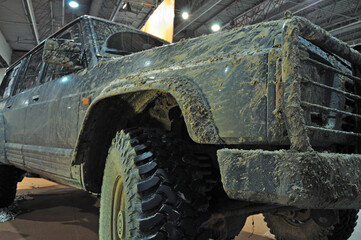 Mud-covered Sport Utility Vehicle