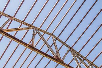 Roof metal structure against the sky.