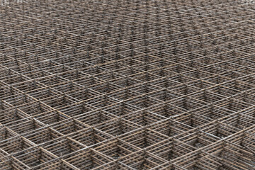 Steel bar iron wire in factory.Steel Rebars for reinforced concrete construction site.Steel reinforcement bar for industrial building