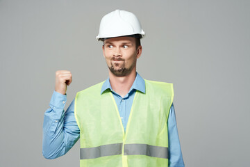 man reflective vest blueprints builder isolated background
