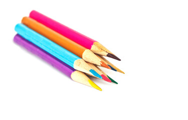 colorful color pencils on white background.