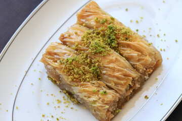 Traditional delicious Turkish food ; pistachio kadayif, Turkish name ; finger twist kadayif