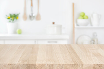 Fototapeta na wymiar Wood table top on blur modern kitchen room counter background