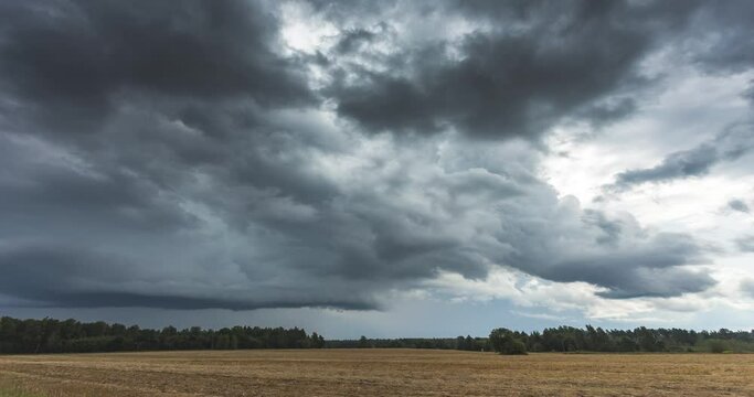 Time lapse of tornado warned splitting supercell storm rolling through the fields in Latvia