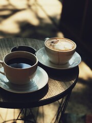 Black Coffee and Hot Latte in the morning for background or digital wallpaper