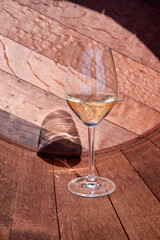 Wine production in Netherlands, white wine tasting glass close up