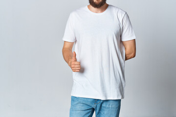 man in white t-shirt and jeans mockup advertisement light background