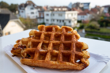 Belgian sugar waffles with black coffee served outdoor