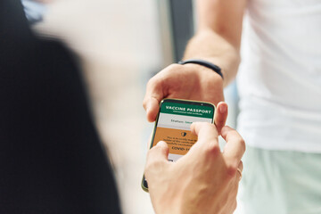 Doctor in uniform making vaccination to the patient