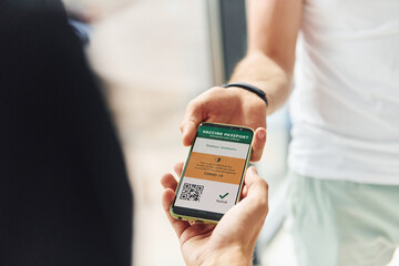 Doctor in uniform making vaccination to the patient
