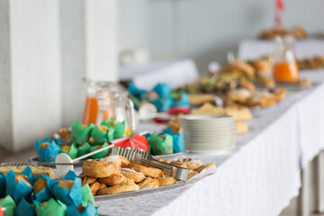 Catering or self-service desk for a conference or business meeting. Snacks and drinks for a light snack in the office.