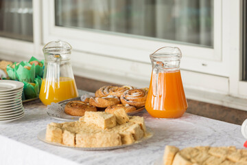 Catering or self-service desk for a conference or business meeting. Snacks and drinks for a light snack in the office.