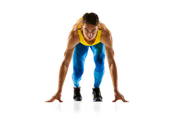 Caucasian professional male athlete, runner training isolated on white studio background. Muscular,...