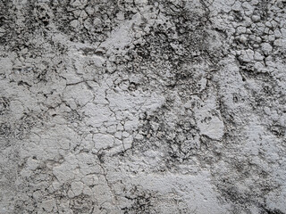White cracked wall abstract background texture pattern.