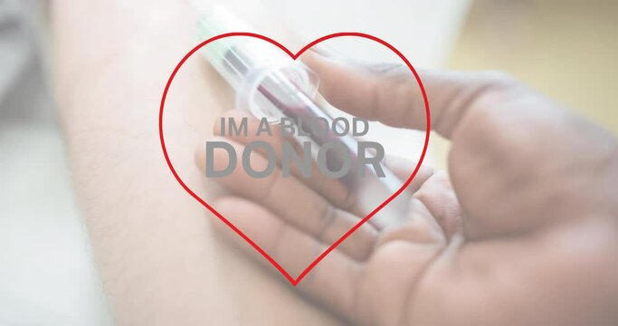 Animation of im a blood donor text over doctor taking blood sample