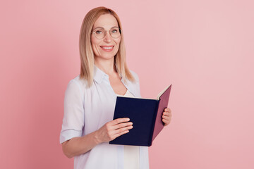 Profile side photo of young attractive woman happy positive smile read book materials isolated over pastel color background