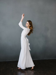 Fototapeta na wymiar attractive woman in white dress glamor posing model