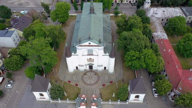 Basilica of the Assumption of the Blessed Virgin Mary in Wegrow town located in Masovian Voivodeship of Poland, 4k drone footage