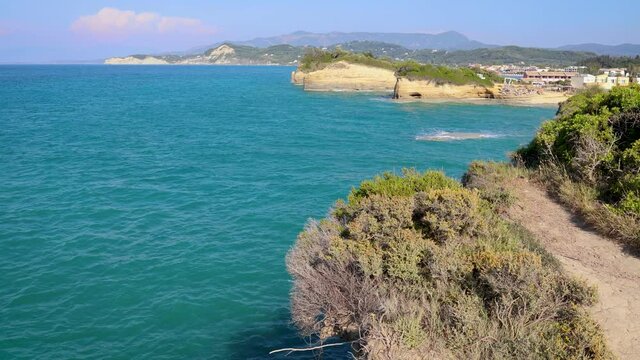 View from cliffs of Kanali tou Erota - Channel of Love in Sidari settlement in northern part of the island of Corfu, Greece, 4k video