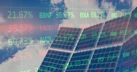 Image of financial data processing over solar panels