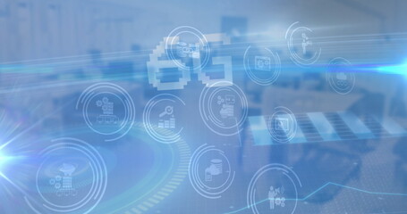 Spot of light and multiple digital icons floating against empty office in background