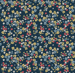 Fototapeta na wymiar Vector seamless pattern. Pretty pattern in small flowers. Small colorful flowers. Dark navy blue background. Ditsy floral background. The elegant the template for fashion prints. Stock vector.