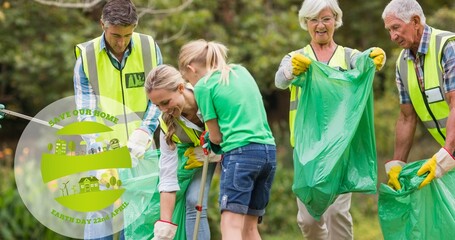Composition of ecology logo and earth day text over volunteers cleaning up the countryside